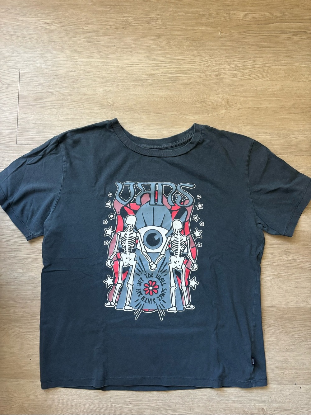 Vans Black Graphic Skeleton Tee with Red & Blue Accents